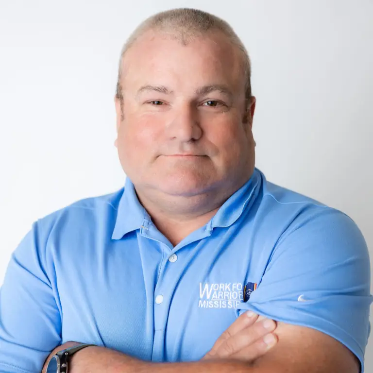 mike hemphill region 1 employment coordinator wearing a blue work for warriors mississippi polo